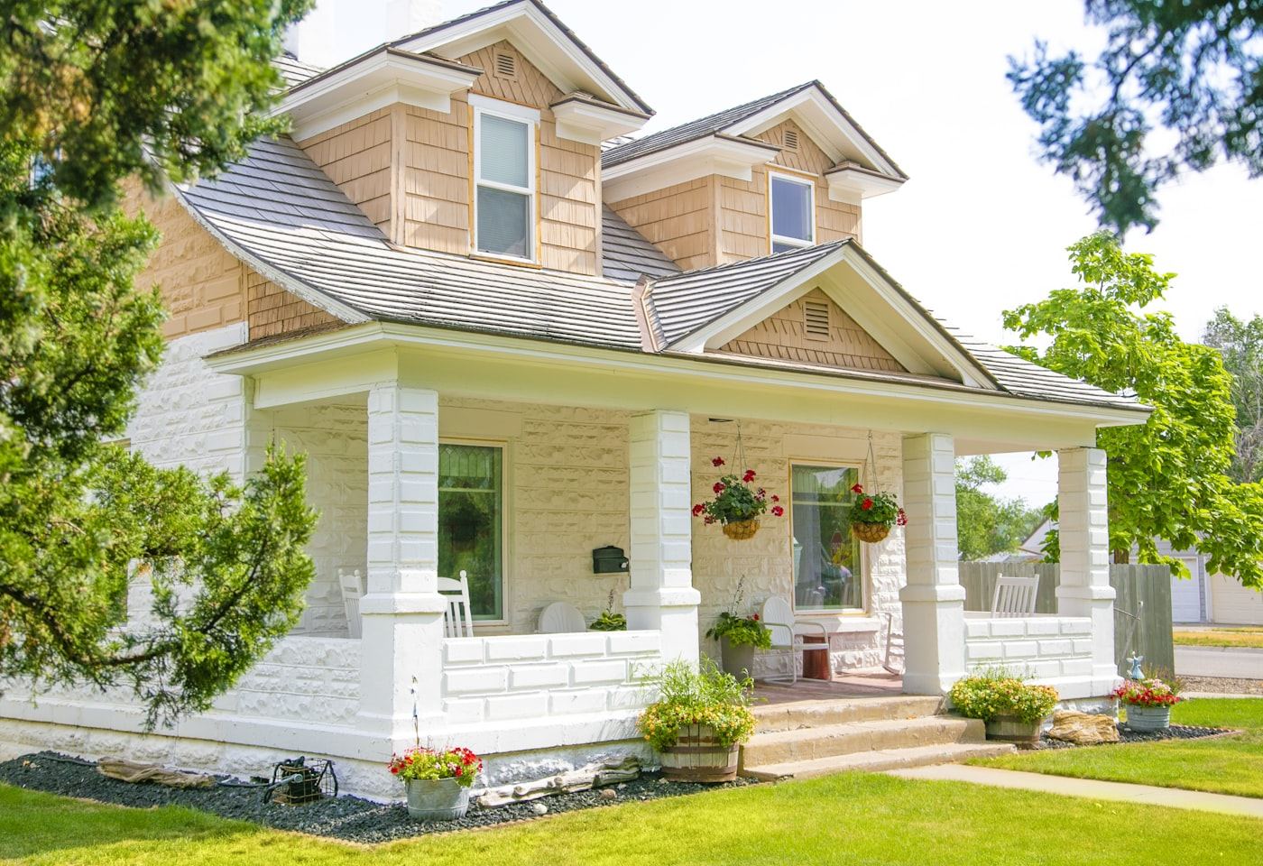 Craftsman house exterior — Tapered columns on stone