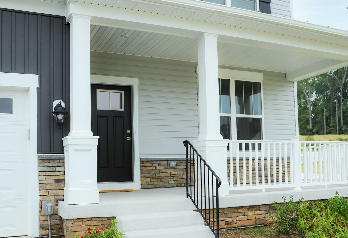 Craftsman house exterior — Dark siding, white trim