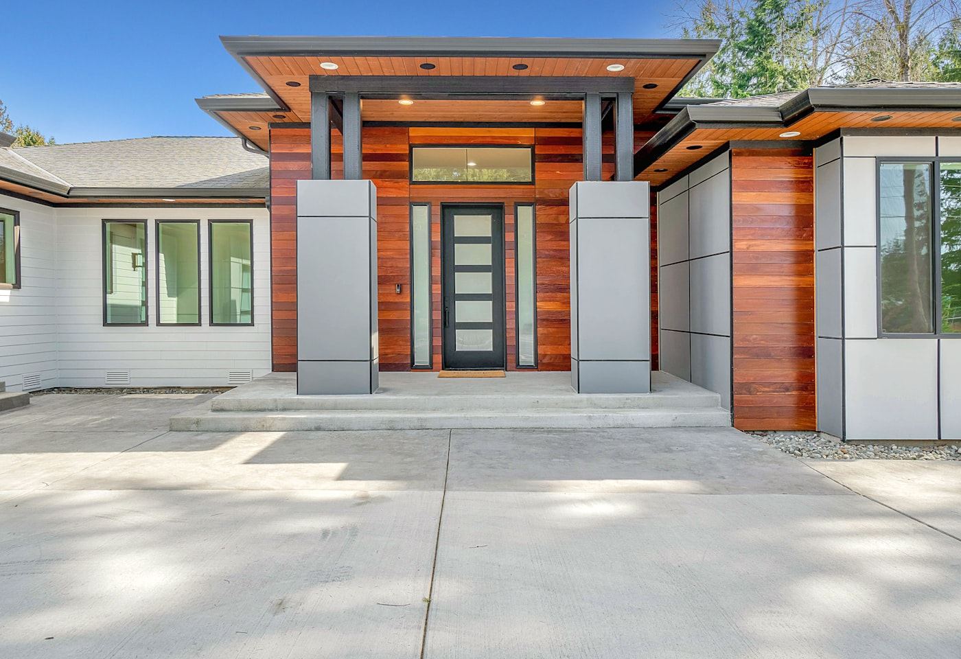 Modern house exterior — Wood at the entrance